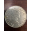 Image 3 : 1958 Canadian 50 cents coin featuring the young portrait of Queen Elizabeth II and the Canadian coat