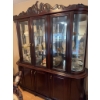 Image 2 : This mahogany china cabinet features glass doors, mirrored back, and interior glass shelving for dis