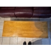 Image 5 :  vintage-style wooden coffee table features a rectangular top, sturdy turned legs, and built-in stor