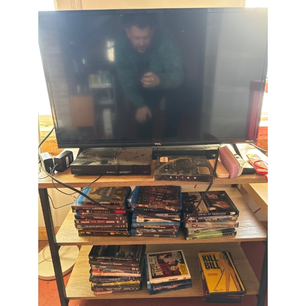  TCL brand television, a Sony Blu-ray player, 