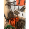 Image 3 : Bag of metal casters with mounting plates, several large metal pipe wrenches, hand tools, and multip