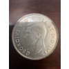 Image 4 : 1947 Canadian 50 cents coin featuring King George VI on the obverse and Canada's coat of arms on the