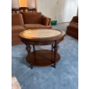 Image 2 :  vintage-style side table features a classic round marble top set within a dark wood frame supported