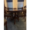Image 7 :  dining table set is a traditional style furniture piece featuring a rich  solid cherry  and elegant