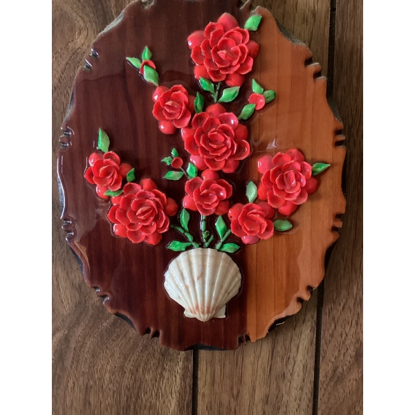 This is a vintage toleware floral wall art featuring a bouquet of roses in a seashell vase,  f