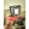 Image 1 : red Scripto Everest gas camping stove, designed for portable outdoor cooking. 