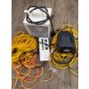 Image 1 : Space heaters and extension cords. Three different sets of very long extension cords.