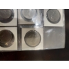 Image 9 : Canadian coins, featuring commemorative dollar coins and 50 cent pieces. Notable coins include a 197