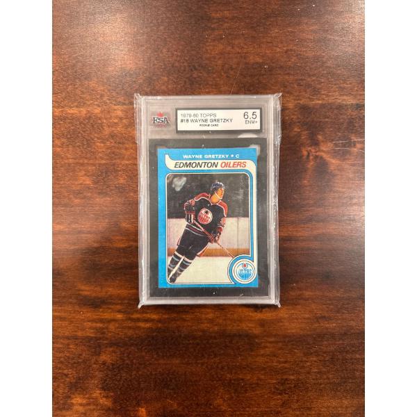  1979-80 Topps Wayne Gretzky rookie card (#18), graded 6.5 ENM+ by KSA. The card features Wayne G