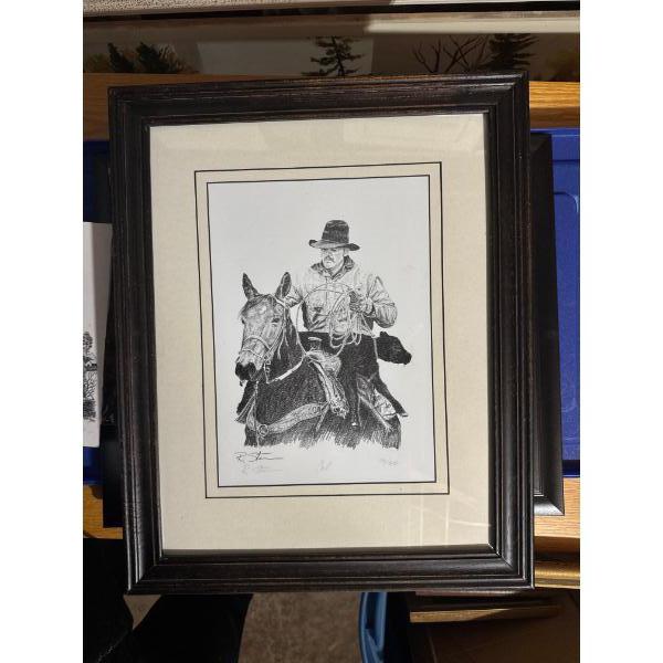 framed artwork is a pencil graphite sketch titled Little Buckaroo by artist Robert Shufelt. 
Artist: