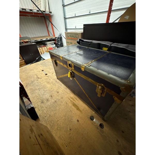 Vintage trunk. 36 inches long by 18 inches wide by 19 inches high..