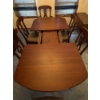 Image 2 :  dining table set is a traditional style furniture piece featuring a rich  solid cherry  and elegant