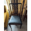 Image 3 : Wooden chair featuring a carved openwork backrest and a black vinyl upholstered seat. The chair has 