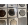 Image 8 : Canadian coins, featuring commemorative dollar coins and 50 cent pieces. Notable coins include a 197