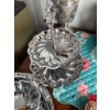 Image 1 : vintage two-tiered serving tray or cake stand featuring a distinctive scalloped, swirl design patter