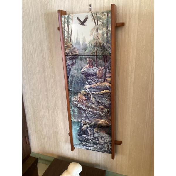 This is a set of four "Cliff Dwellers" decorative plates by artist Kerri Burnett, produced by the Br