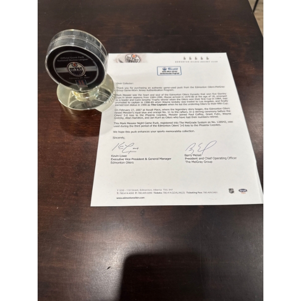 collectible item is an authentic Edmonton Oilers game-used puck from Mark Messier's jersey retireme