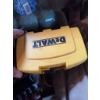 Image 1 : DeWalt screwdriver bit set in yellow case, a metal drill bit set in red case, a torque wrench, and v
