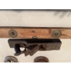 Image 9 : Wooden carpenter's level with brass fittings and inset bubble vial, featuring two viewing windows. T