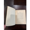 Image 2 :  vintage book titled "War Poems" by Lily Marcus.
The book features a green cover with gold lettering