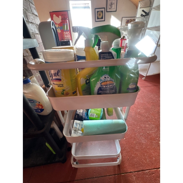 White supply cart with cleaning supplies and all contents included