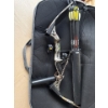 Image 1 :  compound bow kit, which includes a compound bow, quiver, and arrows, all housed in a soft carrying 