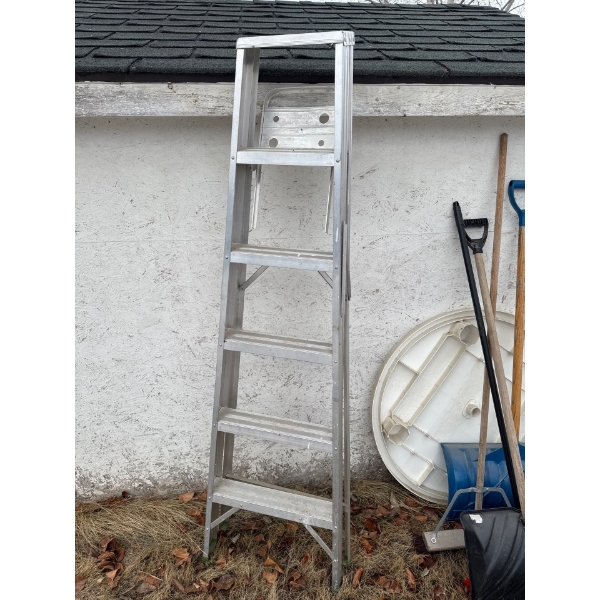 Six foot aluminum ladder.