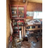 Image 9 : Back corner of shop, all contents included, including hijack, bench.