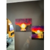Image 1 : two acrylic paintings featuring vibrant sunset landscape scenes with trees and reflections on wate