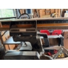 Image 2 : RA-2500 radial arm saw with a 10-inch blade and a 254 mm cutting capacity. The saw is mounted on a m