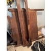 Image 4 : Disassembled wooden bed frame including headboard, footboard, and side rails. The frame shows wear a