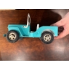 Image 5 : vintage 1960s Tonka Jeep Dispatcher toy, specifically the turquoise and white pressed steel model pr