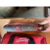 Image 1 : Milwaukee M12 cordless multi-tool with 12V Lithium-Ion battery, charger, and Milwaukee branded carry