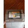 Image 2 : Garmin GPS, three brand new phone chargers, one car adapter, 3 piece car charger, one multiple plugi