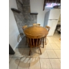 Image 3 :  vintage dining set includes a round maple wood table matching spindle-back chairs. 