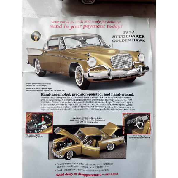 Danbury Mint 1:24 scale diecast model of a 1957 Studebaker Golden Hawk. 
Brand: Danbury Mint. 
Scale