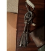 Image 1 : Variety of kitchen utensils, such as stainless steel egg beaters, kitchen knives with black handles,