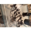 Image 7 : One metal blow torch with a wooden handle, one ribbed metal oil or fuel can, and a group of metal an