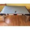 Image 2 :  Maximum folding work table, designed for portability and easy storage in garages or workspaces. 
Fe