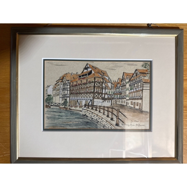 framed artwork is a signed lithograph by artist Maurice Legendre depicting the "Maison des Tanneurs"