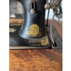 Image 2 : Singer treadle sewing machine, serial number 16165557, featuring original cast iron base and wooden 