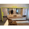 Image 3 : palisar wood bedroom wall unit featuring integrated wardrobes and a central headboard with a mirror.
