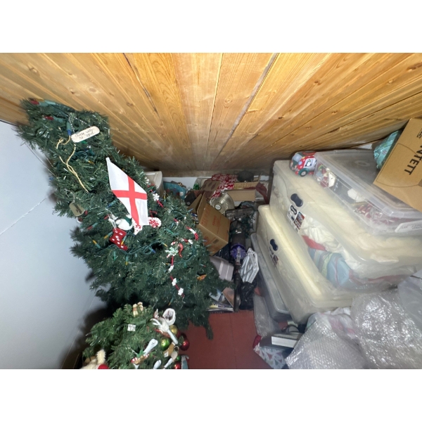 Upstairs, top right corner of building, all contents in this corner are included. Christmas trees, a
