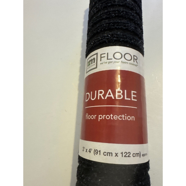 Brand new, never used durable floor protector, 3ft by 4ft in a black color.