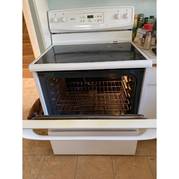  Kenmore self cleaning oven everything works good 28 inch deep 30 inches wide by 48 1/2 inch tall