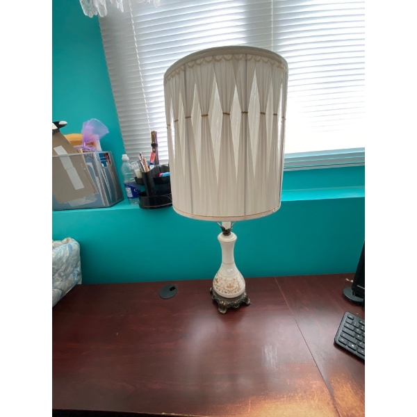  White lamp with shade.