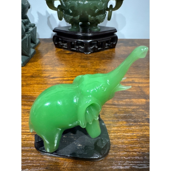  elephant with its trunk raised. 