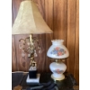 Image 1 : The brass and crystal lamp is a vintage Hollywood Regency style cherub lamp, likely from the 1960s. 