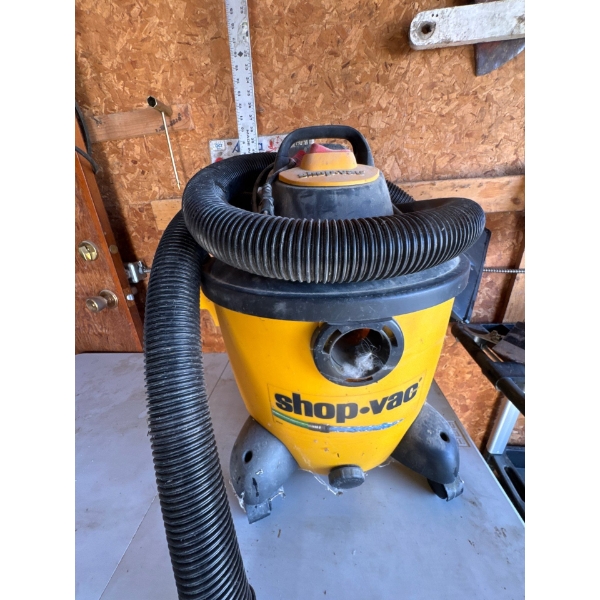  Shop-Vac wet/dry vacuum cleaner, which is designed for heavy-duty cleanups in workspaces, garages, 