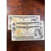 Image 1 : consecutive vintage 1973 Canadian one-dollar banknotes from the "Scenes of Canada" series, featuring
